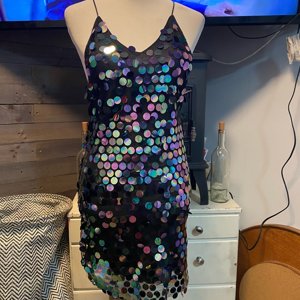 Fun glam flirty mini dress. New W/O tag. Size small